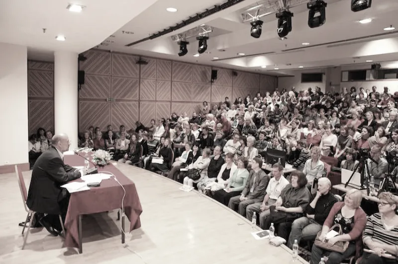 Sergey Lazarev giving a lecture to a full hall